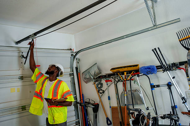 Professional Garage Door Panel Replacement technician working in Lomira, WI
